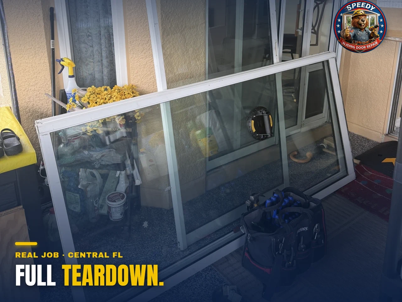 Two sliding glass door panels removed for a full teardown and rebuild — Speedy Sliding Door Repair