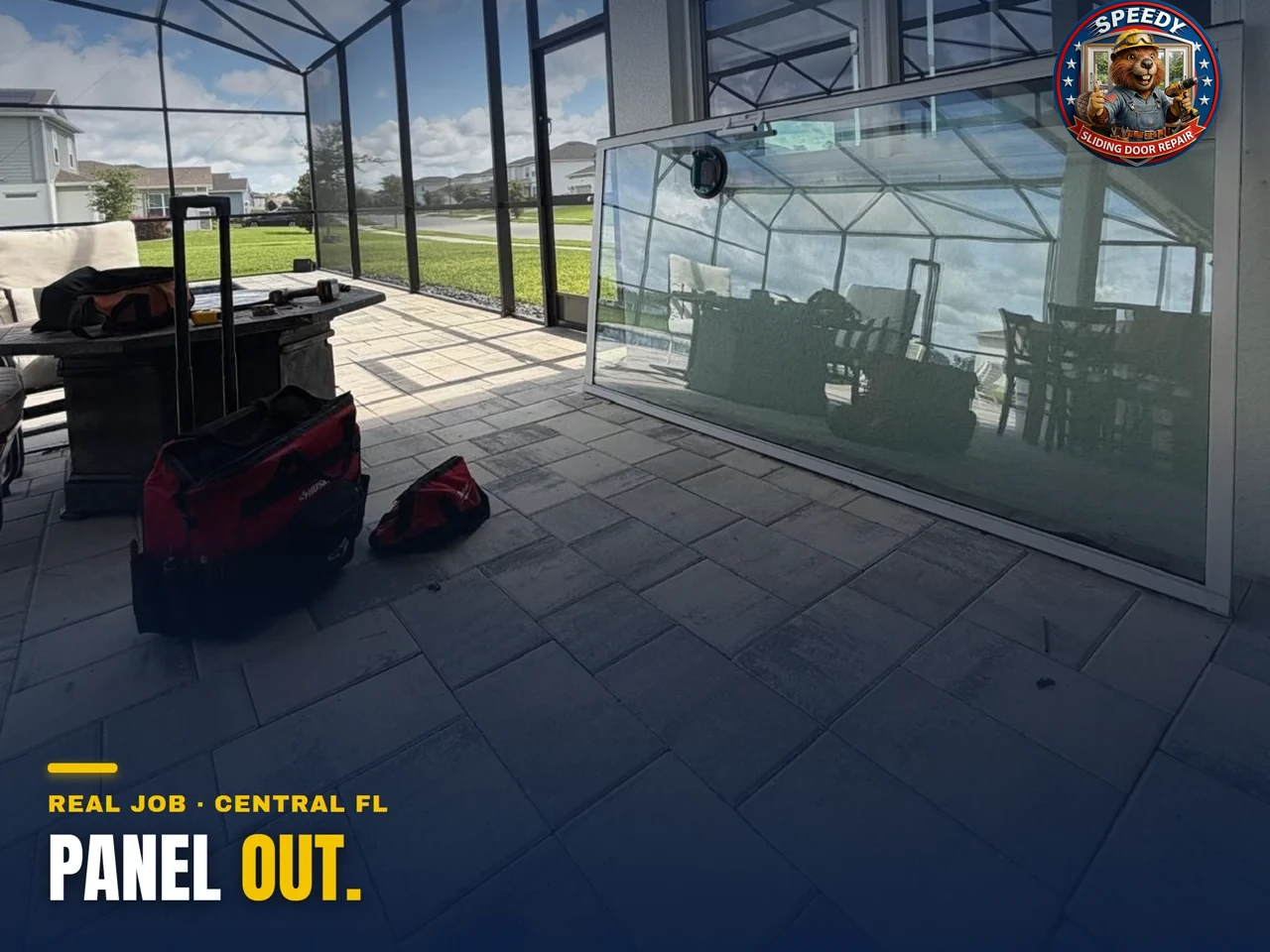 Sliding glass door panel lifted out during a lanai restoration in Central Florida — Speedy Sliding Door Repair